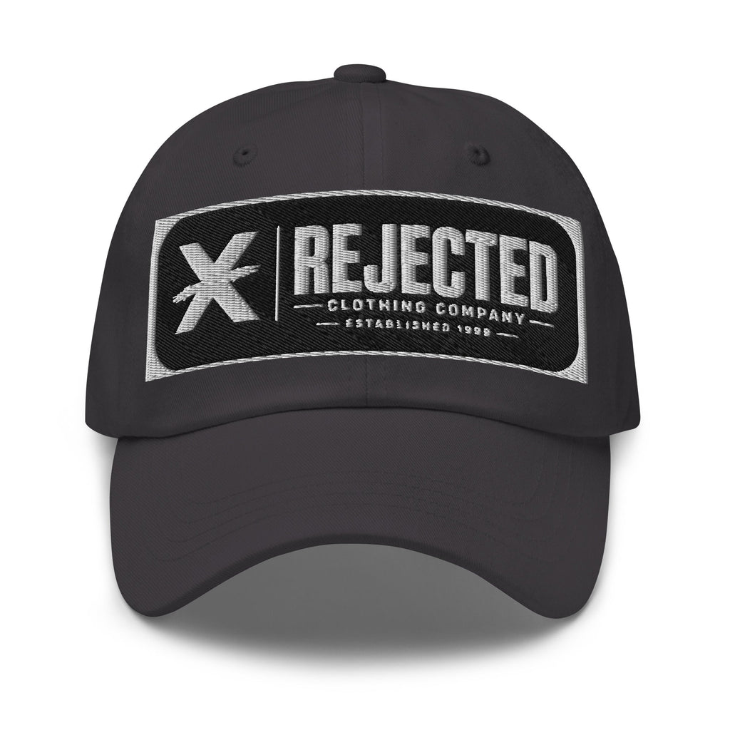 Black cotton dad hat with an embroidered Rejected Clothing Company Established 1999 patch
