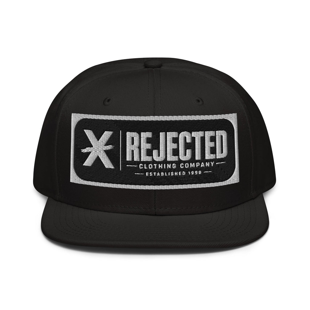 Black snapback with a teal brim and an embroidered Rejected Clothing Company Established 1999 patch