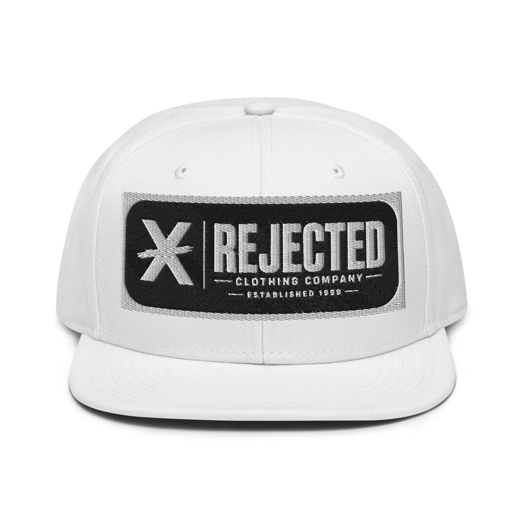 Black snapback with a teal brim and an embroidered Rejected Clothing Company Established 1999 patch