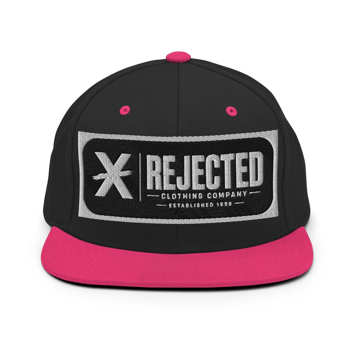 All-black snapback with an embroidered Rejected Clothing Company Established 1999 patch and a green undervisor