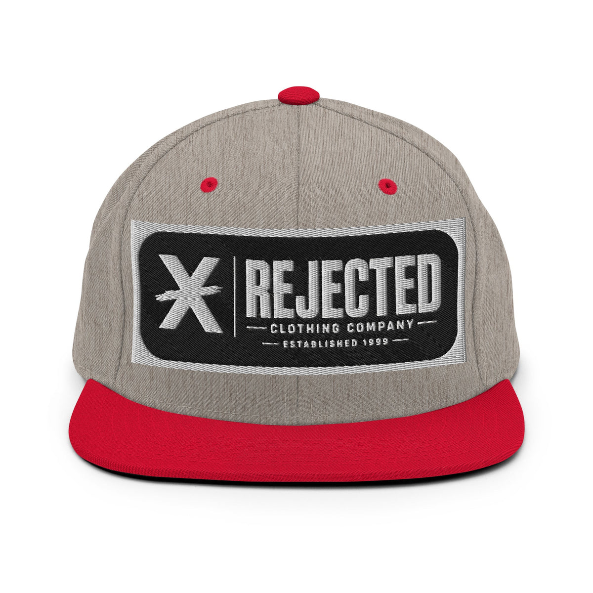 All-black snapback with an embroidered Rejected Clothing Company Established 1999 patch and a green undervisor