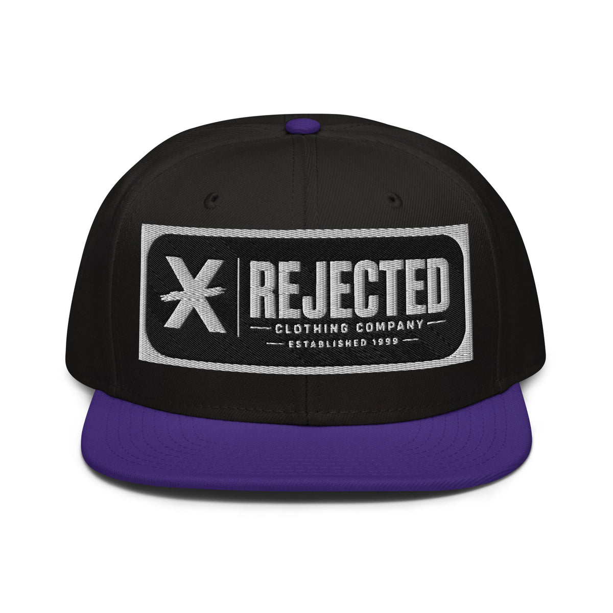 Black snapback with a teal brim and an embroidered Rejected Clothing Company Established 1999 patch