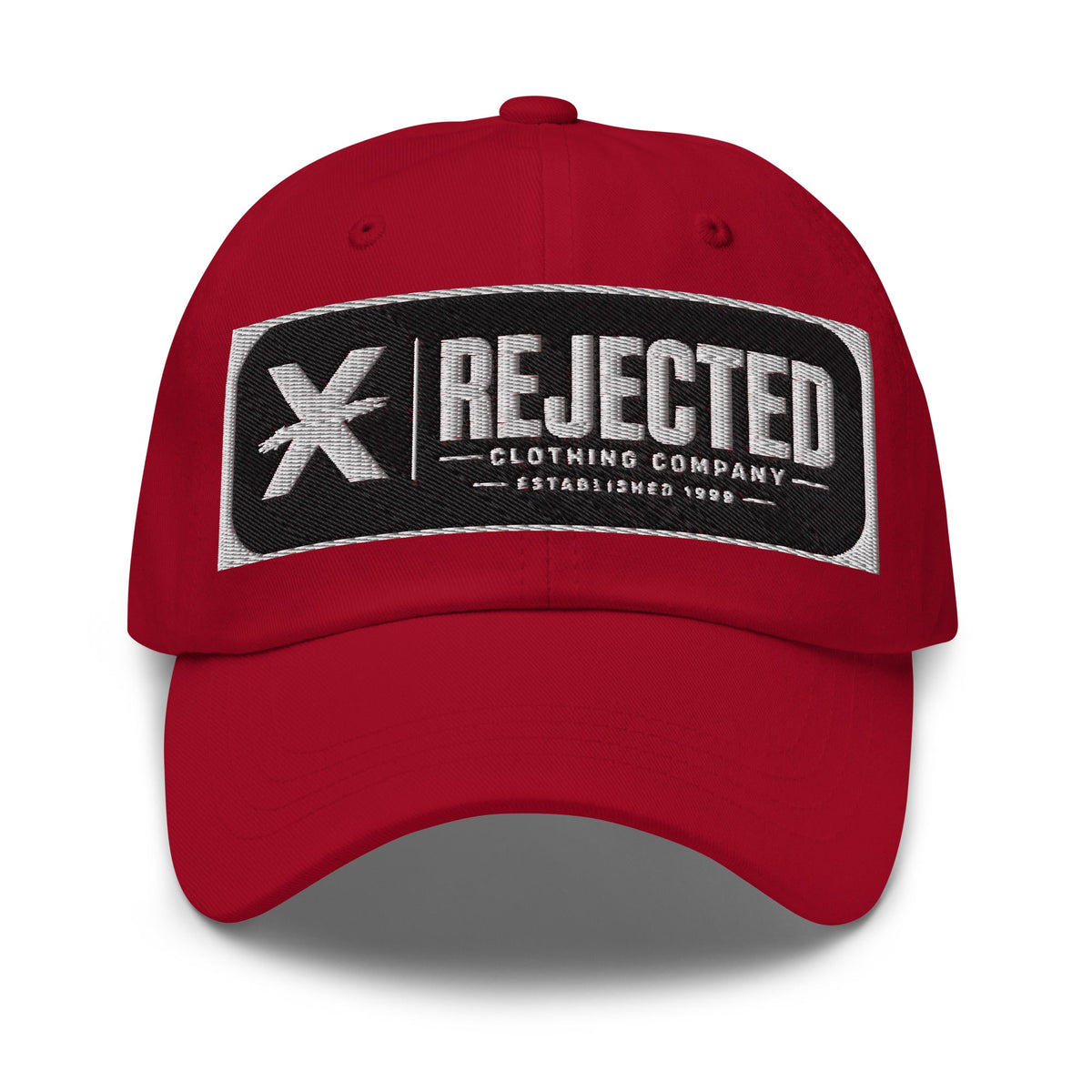 Black cotton dad hat with an embroidered Rejected Clothing Company Established 1999 patch