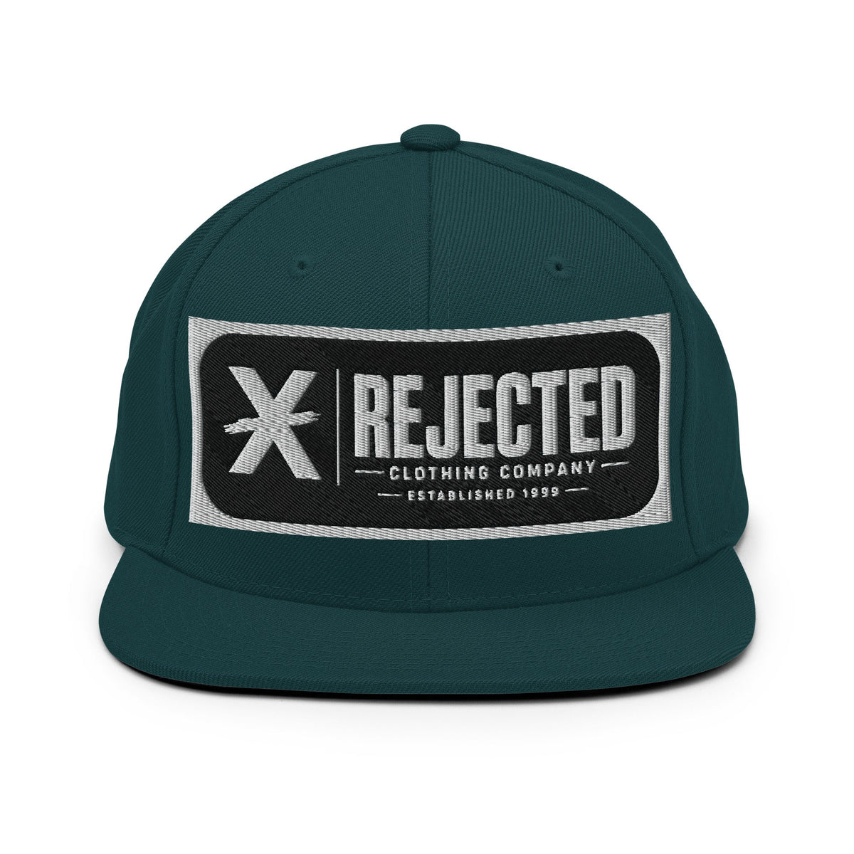 All-black snapback with an embroidered Rejected Clothing Company Established 1999 patch and a green undervisor