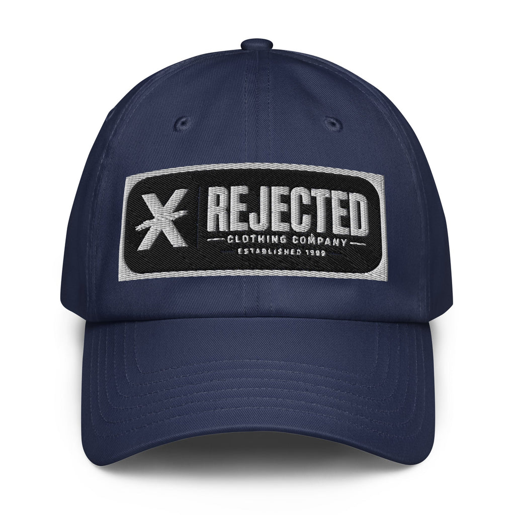 Black Under Armour dad hat with an embroidered Rejected Clothing Company Established 1999 patch