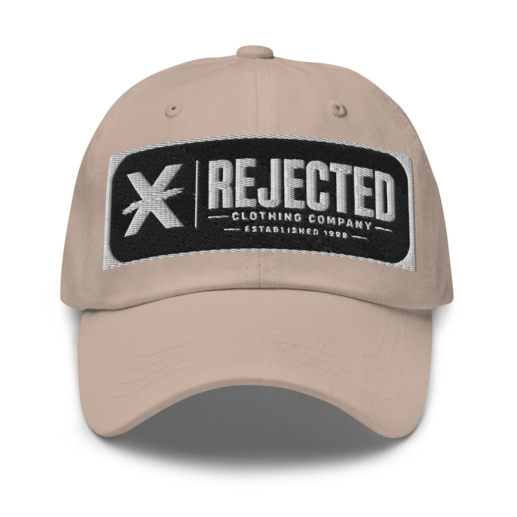 Black cotton dad hat with an embroidered Rejected Clothing Company Established 1999 patch