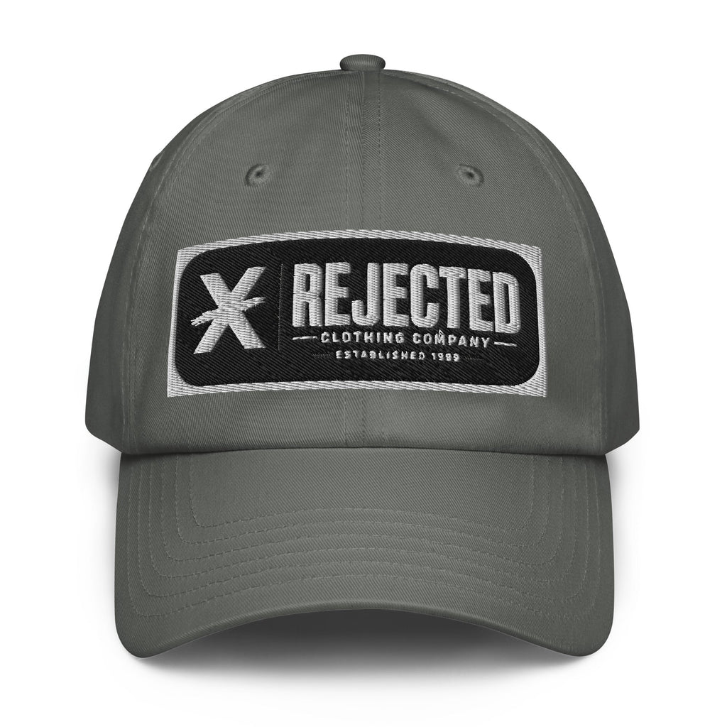 Black Under Armour dad hat with an embroidered Rejected Clothing Company Established 1999 patch