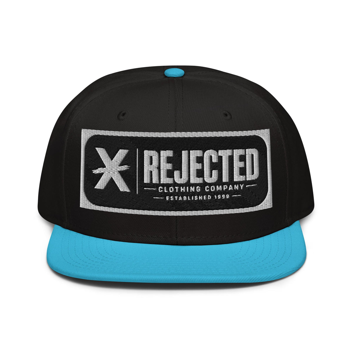 Black snapback with a teal brim and an embroidered Rejected Clothing Company Established 1999 patch